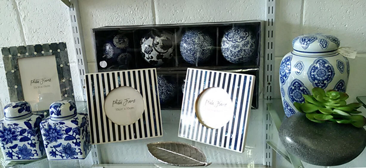 Frames and blue vases