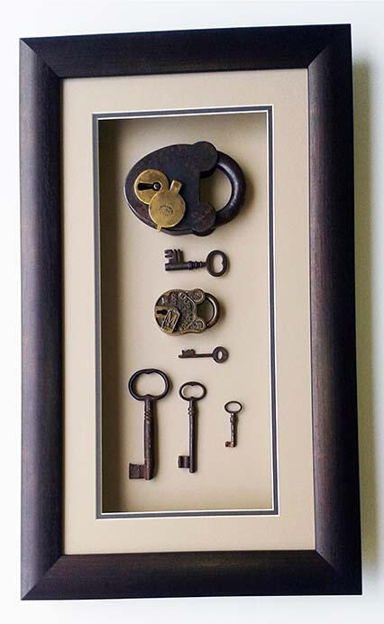 Framed antique padlocks and keys